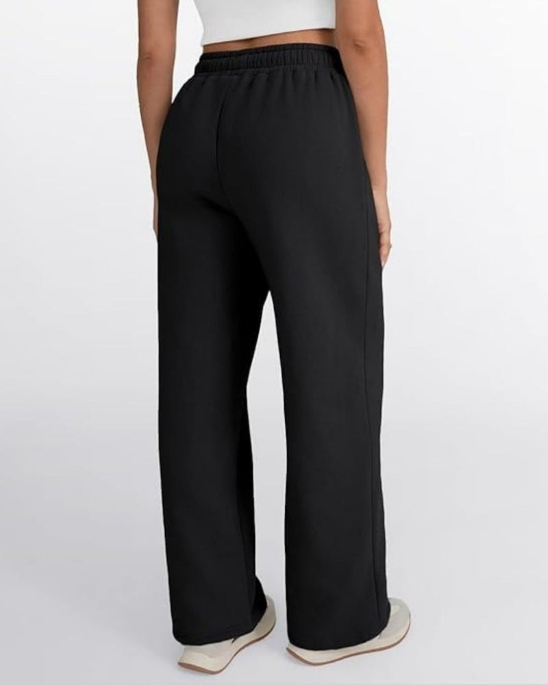 FLYNOFF Solid Black Loose Fit Women Track Pant - Image 1